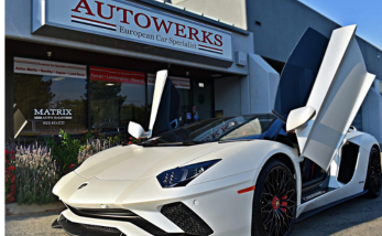 Lamborghini Aventador in front of shop with doors up