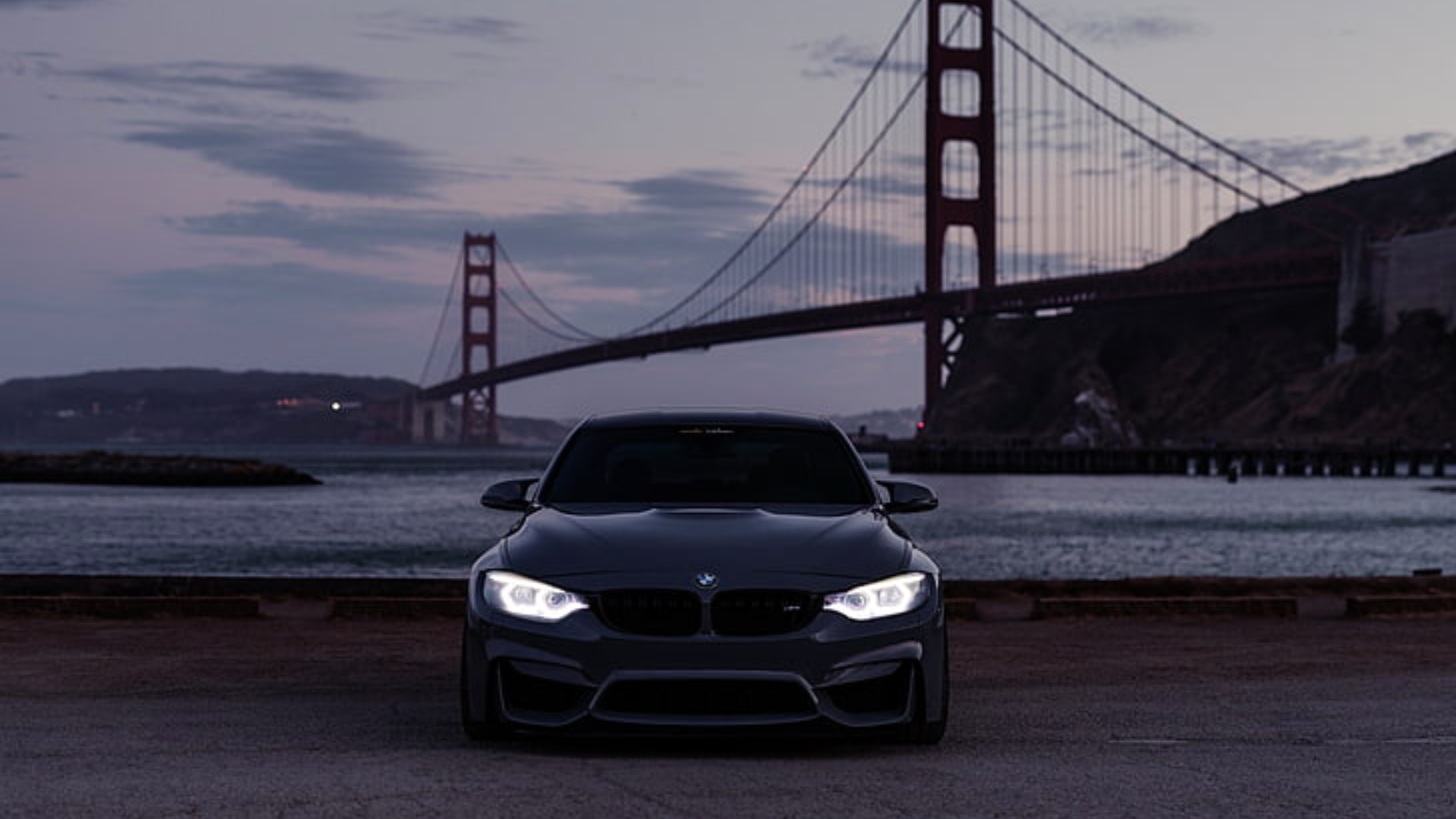 BMW M3 in front of Golden Gate Bridge
